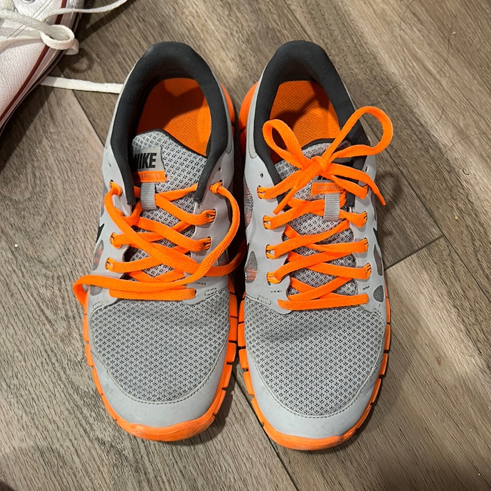 orange and grey nike running shoes